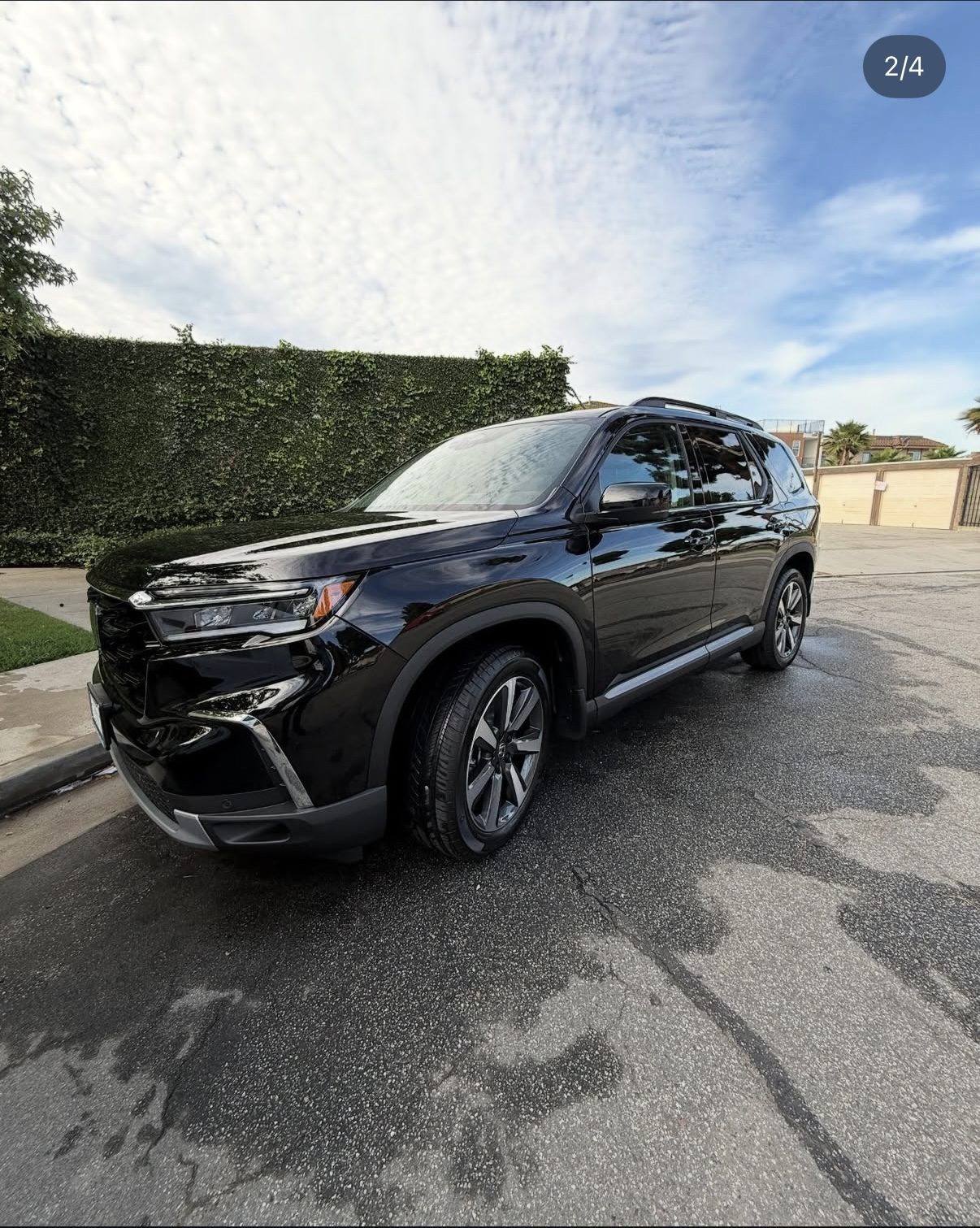 Black Toyota Highlander with deep gloss ceramic coating finish