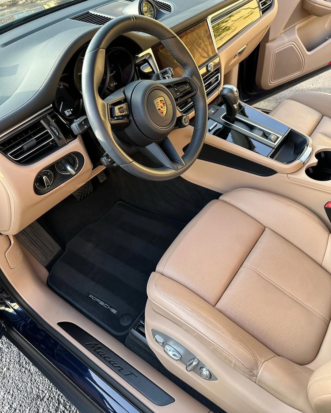 Pristine Porsche interior with tan leather after interior detailing