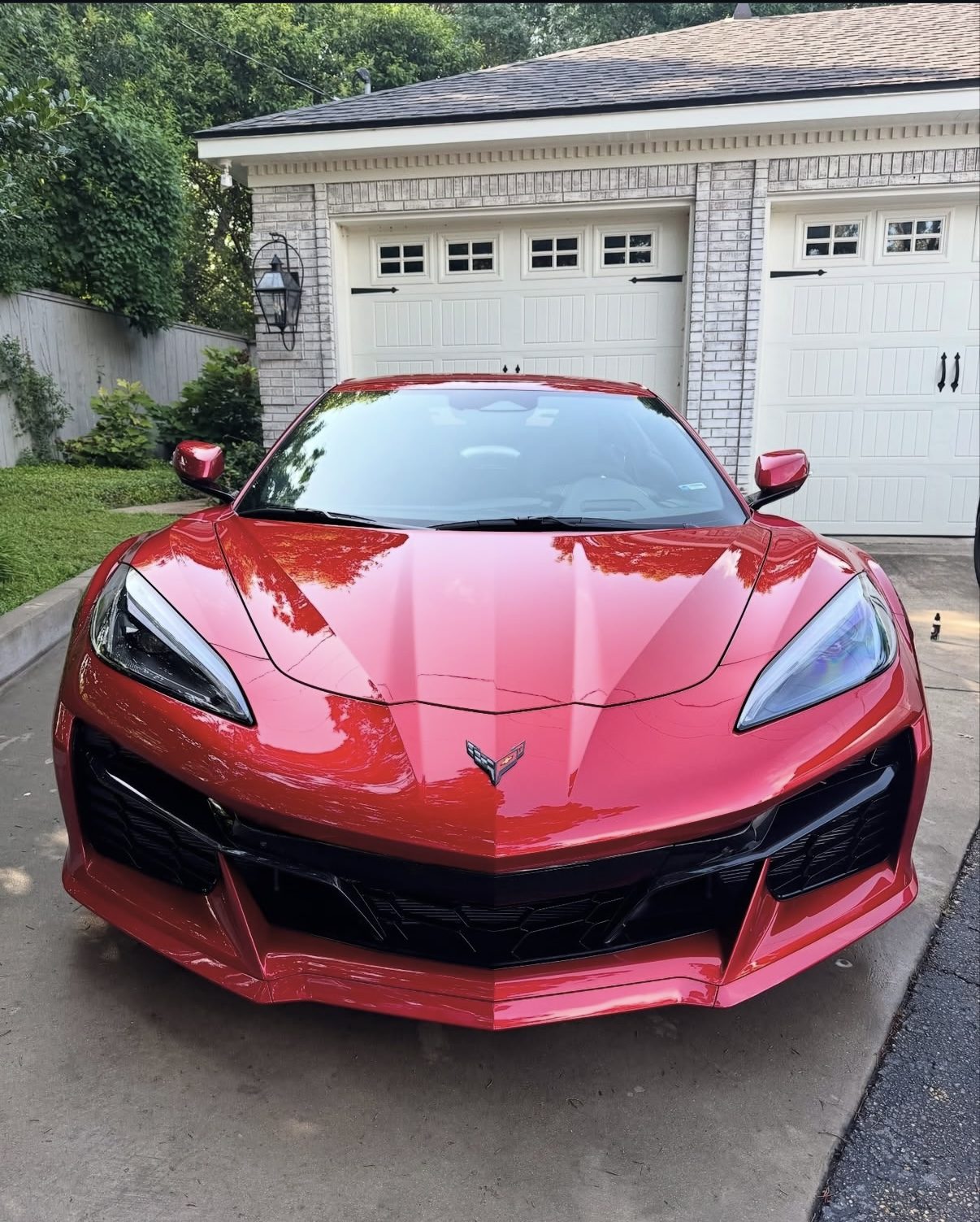 Red Corvette with mirror finish after professional paint correction